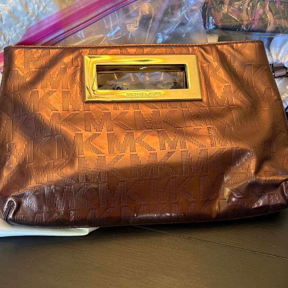 Michael Kors Metallic Copper Logo Wristlet Clutch